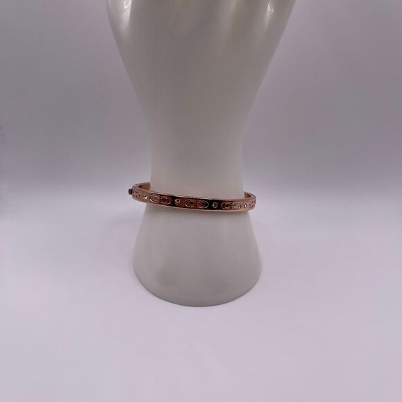 COACH Women's Rose Gold Kissing C Logo Signature Hinged Crystal Bangle Bracelet - Picture 4 of 12